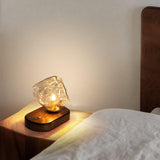Skleněná stolní lampa ve tvaru ledového kamene