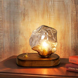 Skleněná stolní lampa ve tvaru ledového kamene