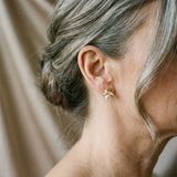 Pearl and zirconia earrings in gold