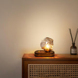 Skleněná stolní lampa ve tvaru ledového kamene