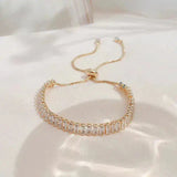Adjustable cubic zirconia bracelet in gold and silver