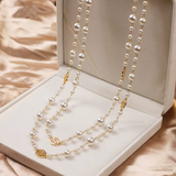 Elegant gold necklace with pearl