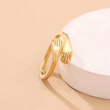 Anillo ajustable en forma de abrazo