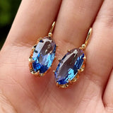 Pendientes Dorados Flor Azul
