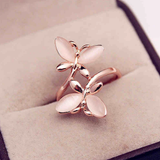 Anillo elegante con flores en oro rosa
