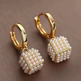 Elegant earrings with cubic pearls