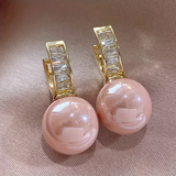Pendientes de oro con zirconia rosa perla